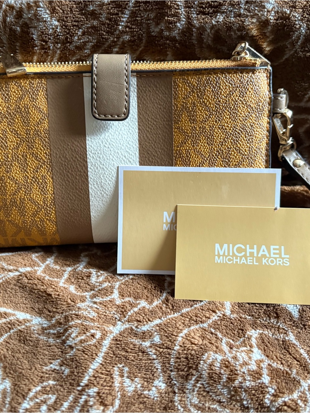 MICHAEL Michael Kors Brown and White Stripe Wristlet Clutch - Picture 1 of 4